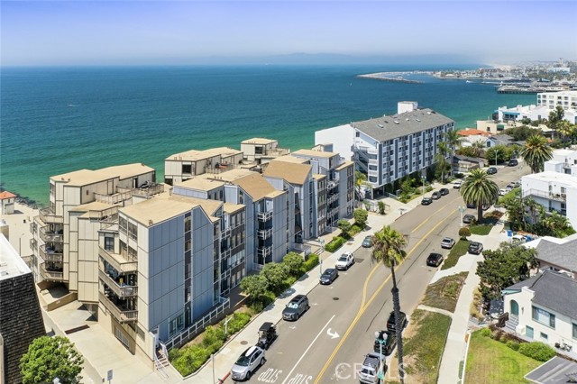 Aerial view of San Simeon with the Renowned King Harbor and Pier to the North.