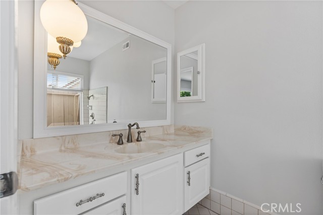 Primary en-suite bathroom with a sunken shower!
