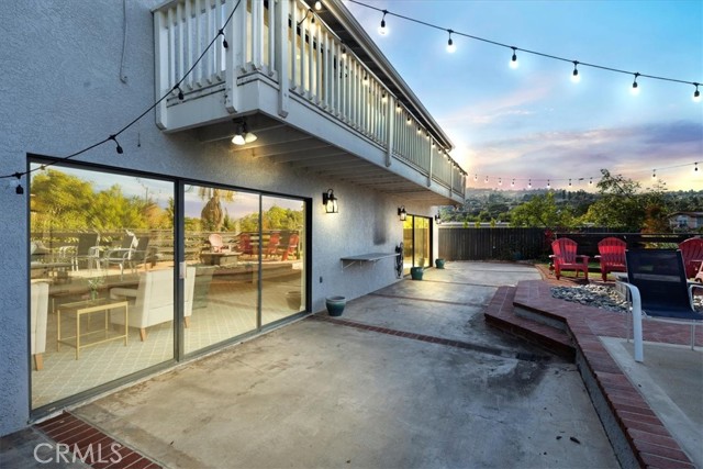 Backyard patio and balcony.