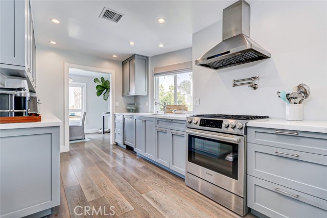 Stunning remodeled kitchen with top-caliber appliances and finishes.