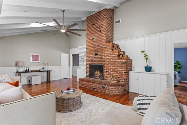 Gorgeous floor to ceiling brick fireplace.