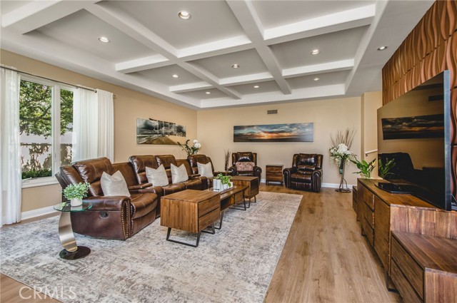 The family room has gorgeous coffered ceilings. The family room has gorgeous coffered ceilings.