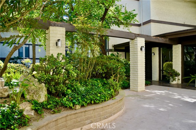Main Community Room with a gorgeous view of Downtown LA. All Mailboxes are located here and makes the position of this home very convenient. There are elevators to lower garage level.