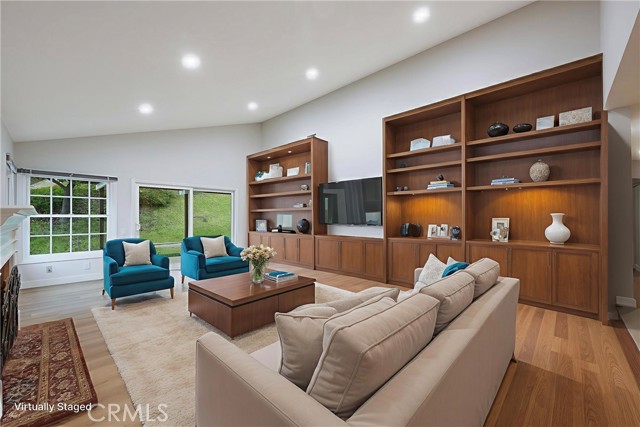 View of the living room toward the sliding doors leading to the back yard.