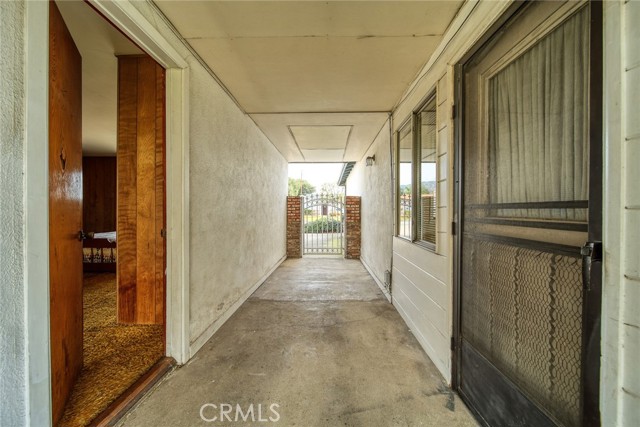 covered breezeway to garage game room