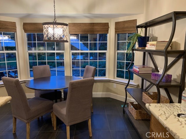 Informal Dining Area with View of Backyard  at Night