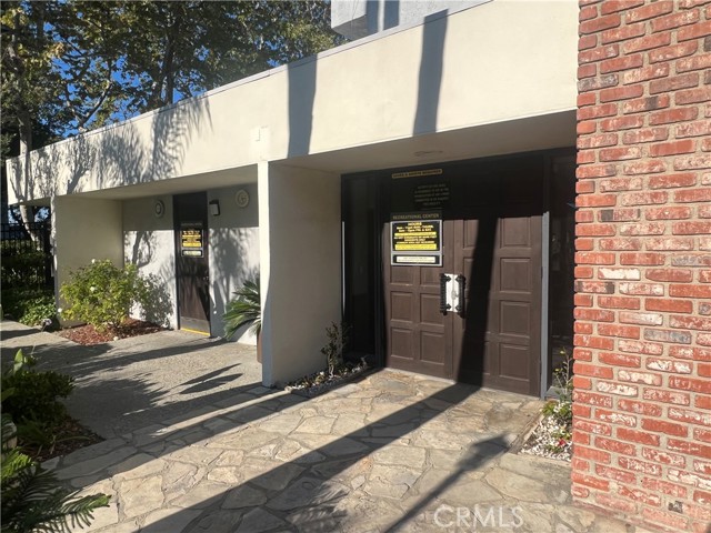 rec room doors entrance from the pool area