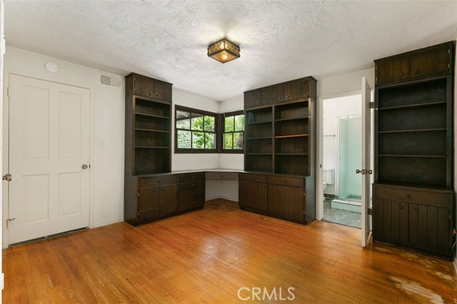 One of the four bedrooms in this home.