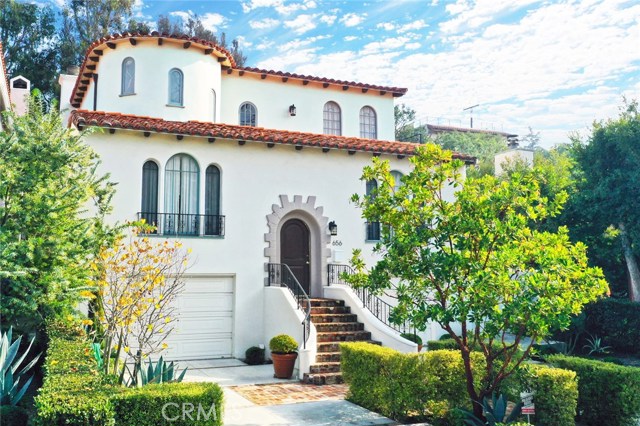 656 Haverford Avenue Pacific Palisades, California Immaculate Spanish style beauty filled with charm, style, and modern detail - just blocks away from the ocean, bluffs and village in desirable Pacific Palisades. High ceilings and beautiful windows flood the home with natural light. Wood floors throughout, recessed lighting, bay windows, French doors, and a spacious gourmet kitchen that connects the living room and family room creating an open flow floor plan. Spacious master suite spans the entire second floor complete with private living room, fireplace, office area, walk in closet, jetted spa tub and gorgeous views from the two step out balconies. Two bedrooms on main living floor with connected bathroom. Large lot with lush terraced backyard and sanctuary deck with elevated views. A private and quiet place to call home ... with the Palisades Village shops, award winning schools, fine restaurants and much more right down the street. Come see this beautiful home today.