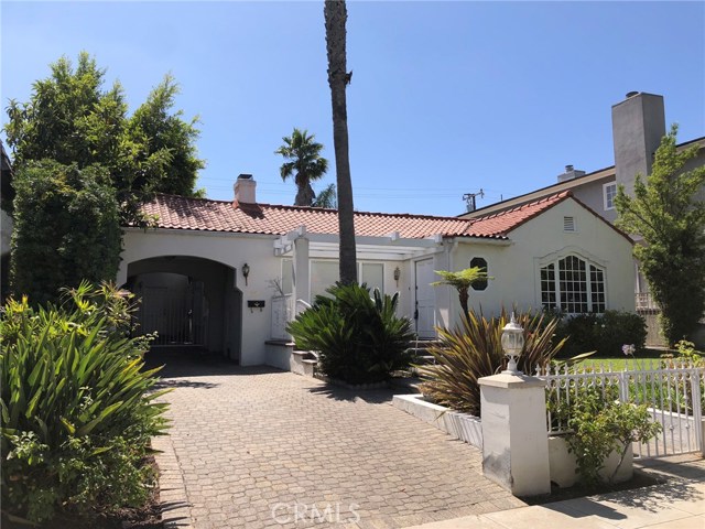 225 S Palm Drive Beverly Hills, California Beautifully remodeled home in the heart of Beverly Hills! This lovely property is light and bright and features an open floor plan with marble floors, chef's kitchen with marble counter-tops, large island, stainless steal appliances and lovely cabinetry. Kitchen and family room open up to the beautiful backyard which is nicely manicured and great for entertaining. Home also has two fireplaces, hardwood floors, upgraded master bathroom with walk-in closet, recessed lighting, plantation shutters, tank-less water heater and so much more! Just minutes from the coveted Beverly Hills Triangle with the finest shopping and restaurants!