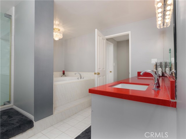 Oversized Full Bathroom w/ Dual Sinks, Quartz Countertops, Separate Tub & Shower.