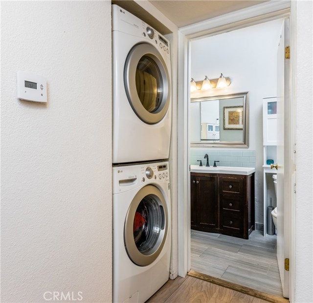 Laundry Area in Hallway leading to Bathroom