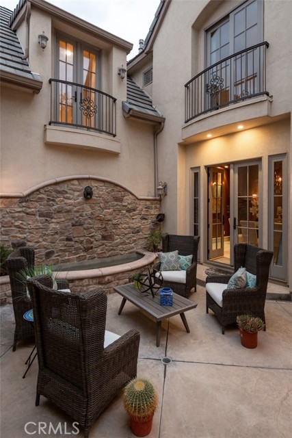 Beautiful Courtyard with Waterfall Off formal Entertaining