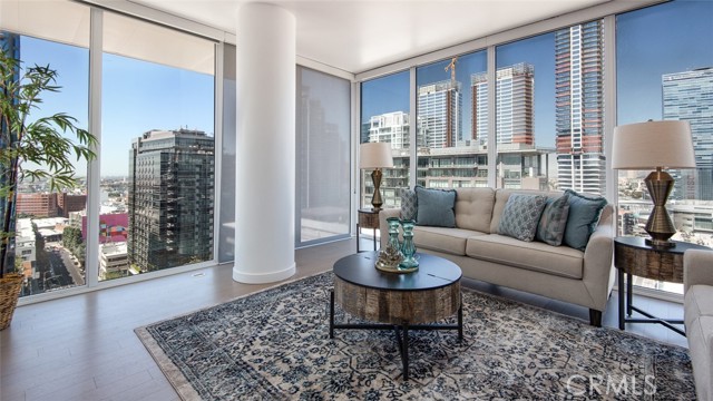 1050 S Grand Avenue 1901 Los Angeles, California Views, Views, Views!!! Create your daily inspiration by waking up and going to bed with amazing views of Los Angeles from the 19th floor of Ten50 S. Grand Ave.!!! 24 hour front desk access with security for the entire grounds. Private garage structure tandem parking for in and out access to where you need to be. On site private gym, roof deck pool, yoga area and conference centers for your personal and professional needs plus a private viewing room as well. A hop skip away from anything Downtown Los Angeles. Be in the scene by living in the scene!!! The Suite itself is a corner unit with a view facing West, South and partially North of the building. Breath taking during the day and inspiring at night! 1,400 sq ft of total living space, 2 bedrooms & 2 bathrooms make this ideal for the city family or for those who may want to work from home, make this yours!!!