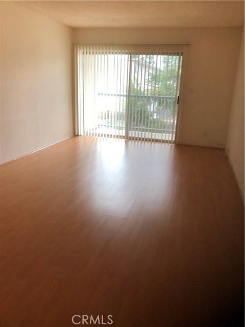 18307 Burbank Boulevard 107 Tarzana, California This bright airy 2 bedroom condo has a center floor plan with bedrooms on either side of the living space. Each bedroom has large closets and private bathroom. Light floors in living space with plush carpet in the bedrooms. Balcony off of living room, central air, two covered parking spots in secure gated lot. This elevator building is gated and secure and includes a pool, spa and game room, with laundry on each floor.