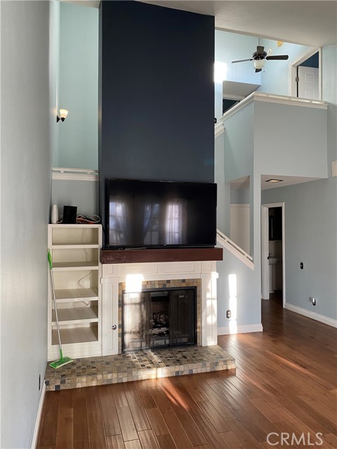 Living room with fireplace,High ceilings,Smart TV