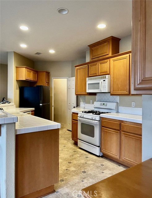 Check out the pantry at the end of the kitchen!