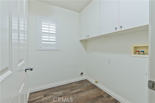 laundry room upstairs with most bedrooms