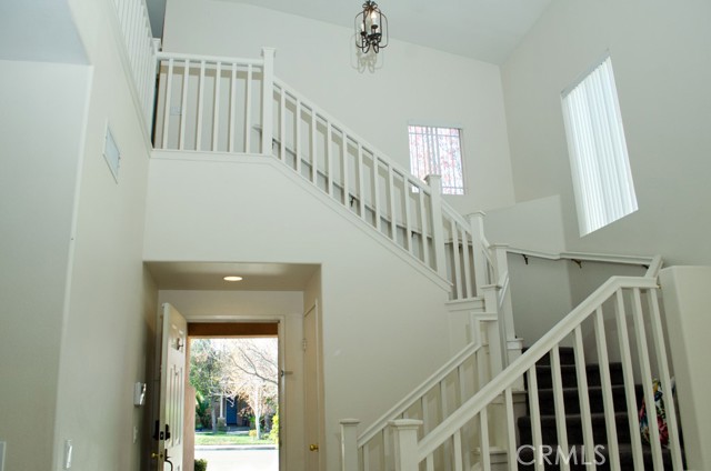 Staircase to upper level and bedrooms