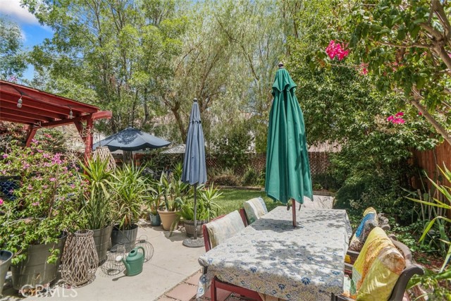 looking from third patio area to yard