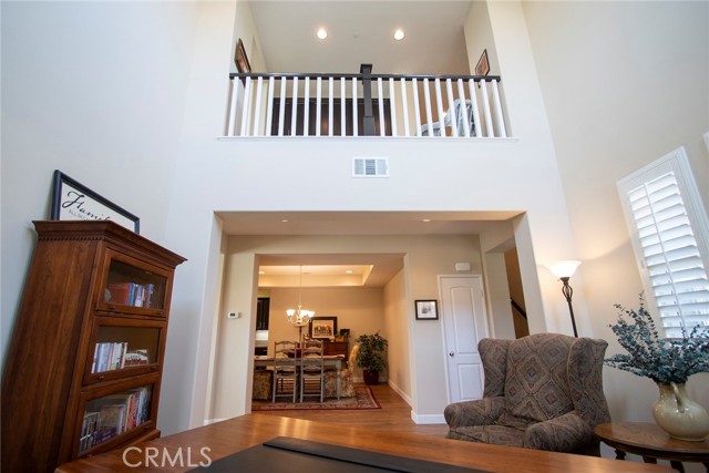 Large living room boasting lots of natural light.