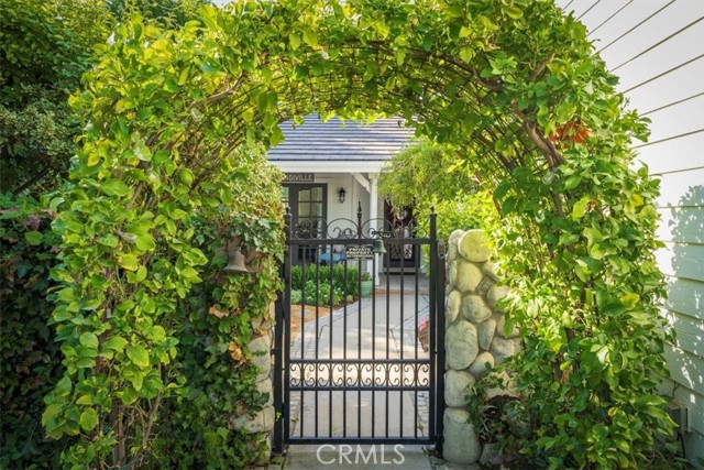 This lemon arch leads you to your dream cottage home.