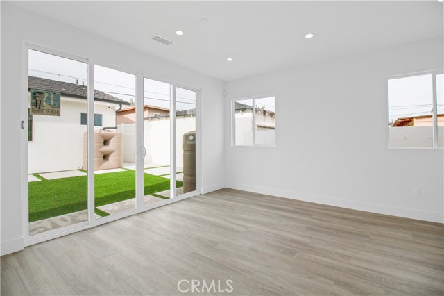 SLIDING DOORS LEADING TO BACKYARD