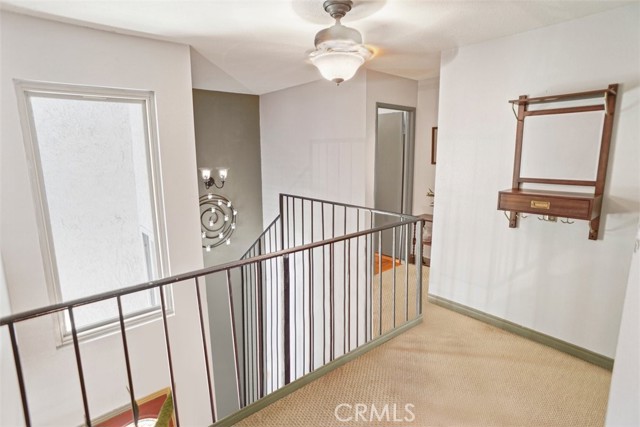 upstairs landing looking down to staircase.