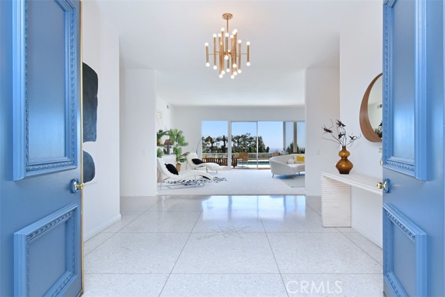 10834 Savona Road Bel Air, California Classic and timeless, this glamorous mid-century estate presents a truly unique opportunity in Mid Bel Air.
This one-story, four-bedroom, four-bathroom home has a thoughtful layout including a formal dining room, a spacious kitchen with plenty of room for eat-in possibilities, and an expansive living room with an outpouring of natural light. Crisp whites create a serene ambiance in the home while enjoying the indoor, outdoor feel with direct access from the den and living room. The master suite is perfectly located down the hall and designed with a walk-in closet and en suite bathroom. With panoramic views from the city to the Pacific Ocean, the backyard welcomes entertainment of all kinds.
Come experience comfort and style in this stunning sanctuary tucked away in the heart of Los Angeles.