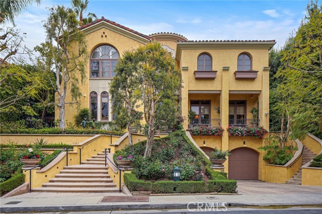 14151 Beresford Road Beverly Hills, California Magnificent Villa professionally updated with attention to detail and designer custom touches throughout; this Estate eudes character and charm.
Dramatic two -story foyer leads into formal living room, extra large formal dining room, office/den,and family room (than can also be a media room). Professional Gourmet kitchen features center island, large breakfast area top of the line stainless steel appliances over looks the beautifull private landscaped yard. With pool,spa built in bbq area,koi pond and secluded cabana . second story features front and back staircases, along with private elevator. A dramatic master suite with fire place and sitting area, large master bath with separate sinks , spa tub and steam shower plus large walk in closet. Three large additional suites and cozy den with patio over looking the beautiful private Estate. finished lower level features maid quarters, storage and 4 car tandem garage. This home is located in the private and gated Mulholland Estates Community with easy access to Westside and valley. Close to many of the top Private schools.