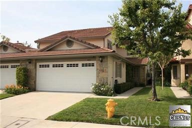 19474 Eagle Ridge Lane Porter Ranch, California Stunning Porter Ranch Executive Home in Gated Community . This home features 3 bedrooms, 2.5 baths, Master Suite/Bath with huge closets and private balcony. Great Floor Plan with Living Room, Formal Dining Room, Family Room w/fireplace. The cook's kitchen has loads of counter and cabinet space. Large open floor plan, inside laundry room and two car garage, The rear grounds boast a lush landscaping, covered patio and very private. The community provides pool, spa, tennis court, +++. Great school district. Quiet neighborhood