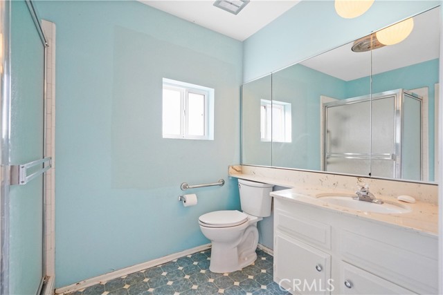 Attached bathroom with a shower of the upstairs primary suite