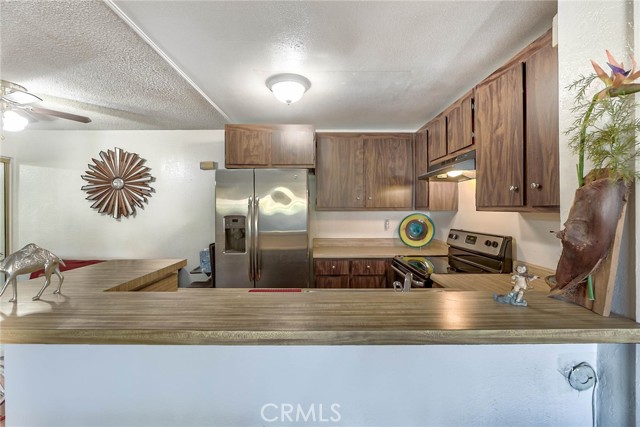 Kitchen with bar seating.