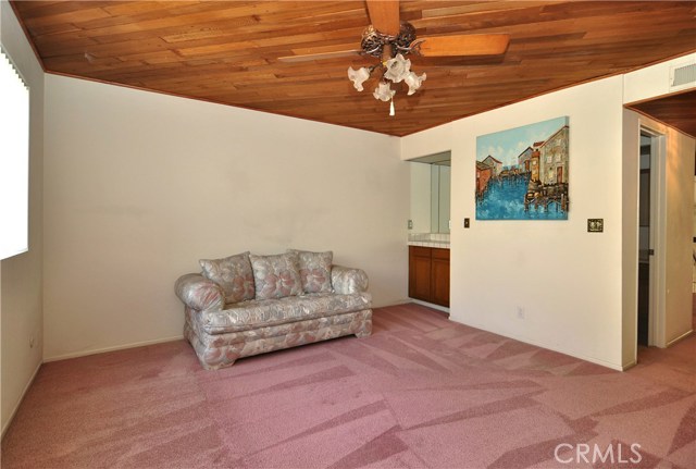 Family room/Den with bar off the kitchen area.