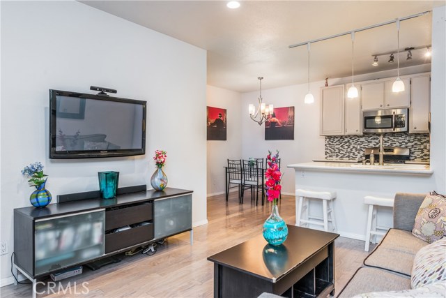 Living Room opening up to Kitchen and Dining Area