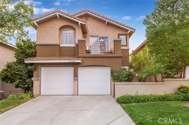 27618 Morning Glory Place Castaic, California In the heart of Castaic, you will find the desirable, gated community of Marigold! This 4 bedroom, 3 bathroom unit features 1,705 Sq. Ft of living space and private 2 car! As soon as you walk in through the door you will notice the soaring ceilings and lots of windows letting in plenty of natural light. The living room welcomes you with its dual sided fireplace featuring stone tiles. The adjacent family room has a sliding glass door that leads to your own private back yard where you can enjoy your morning coffee or a glass of wine. Kitchen with granite countertops, stainless steel appliances and center island with breakfast bar. Head upstairs to find 3 spacious bedrooms and the master suite. The master suite has a private balcony and private full bath with granite counters, walk-in closet, vanity area and dual counter top sinks. This family friendly community is perfect for those that want to be close to it all with shopping, parks, restaurants, schools, city transportation and the freeway nearby! Welcome Home!