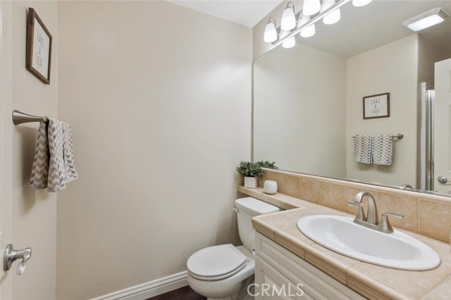 downstairs bath has shower behind the door