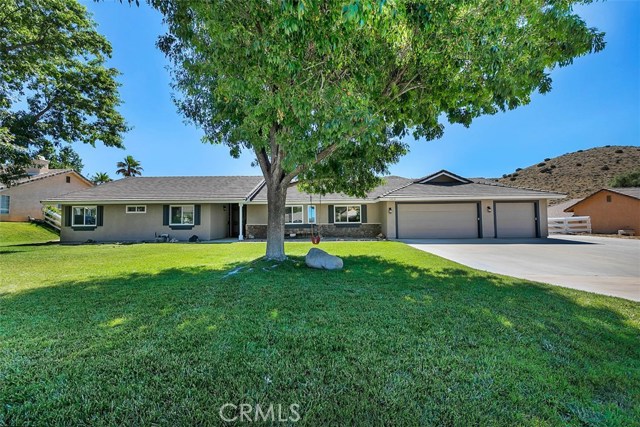 34354 Brinville Road Acton, California Stunning single story home in the highly sought after Crown Meadows Estates! Many upgrades set this home apart. Gorgeous remodeled kitchen w/Quartz counter tops, farmhouse sink, under cabinet lighting, induction cook top, maple cabinets w/soft close/dove tail drawers, double oven, dishwasher & spacious kitchen island. Beautiful Core Tec waterproof flooring w/cork underlay. Neutral carpet in bedrooms. Recessed LED lighting w/dimmers; Interior walls, ceilings & doors recently painted w/newer hardware; Designer ceiling fans; Bathrooms have newer toilets, stainless steel faucets & nickel lighting; Master bath has soaking tub, separate shower & spacious walk-in closet; Separate laundry room/mud room w/sink; New front door; New Energy Star dual pane windows; Newer closet doors & sliding doors w/built-in blinds; Full Pex re-pipe; Brand new 75 gallon water heater; Water filtration system; Newly painted exterior; Tile roof; Alarm system; 3-car attached garage; Newer Ryobi garage openers; Permitted workshop-approx. 17'6" x 17'4" w/sink, water heater, A/C, separate electrical panel & 220 volt wiring. Makes a great man cave, craft room & more! Drought tolerant, sprawling backyard w/shade trees; Fully fenced property; Horse facilities include: tack room, wash rack, riding arena w/lights, 2 horse stalls & direct access gate to one of the most popular riding trails in Acton. RV parking; Tree lined, paved road; Ease of County water, high speed internet & natural gas. Don't miss this home!