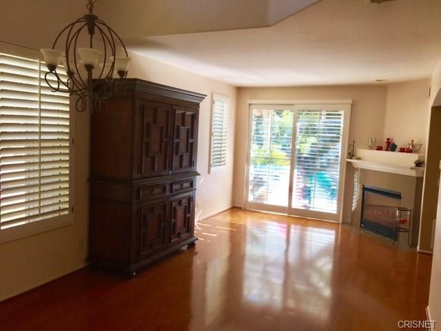 Formal Living Room/Dining Room with Fireplace & Slider to Backyard