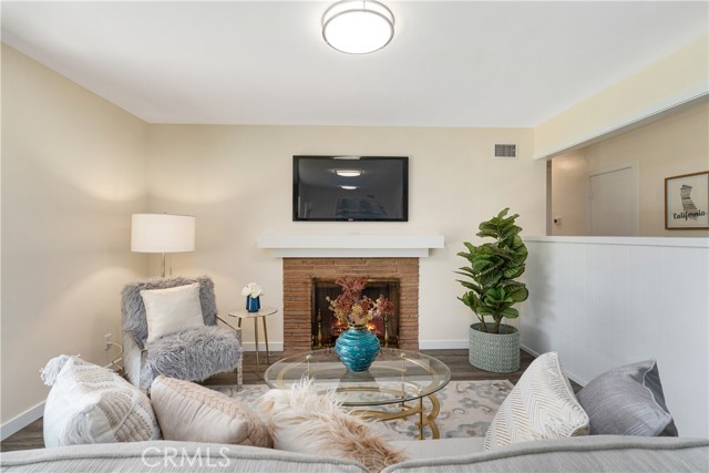 Large family room with brick fireplace