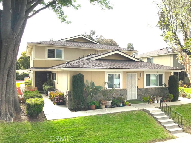 Full view of the property with entrance on the left