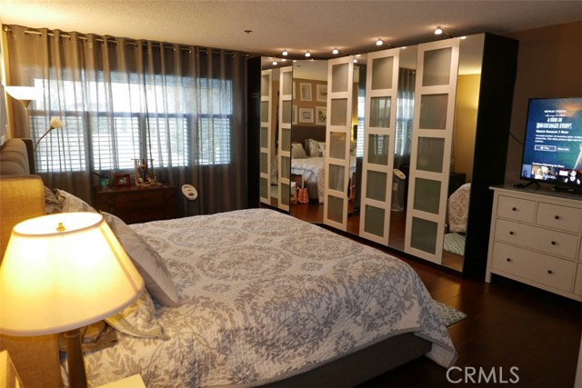 Master's Bedroom with wide windows that give access to view the courtyard.