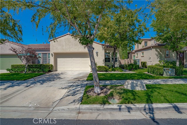 28031 River Trail Lane Valencia, California Fantastic Belcaro residence with incredible location and view! This premiere 55 plus community provides the ultimate upscale adult experience! As you enter your new home you enter the large gated entrance and wave to the one of the security guards. You drive past the amazing clubhouse facility with resort style pool and Jacuzzi, tennis court, pickle ball courts, basketball court, bocce ball, vegetable gardens, direct access private gate to the paseos and trails. Continue down the tree lined street to your large home with master bedroom and office downstairs, 2 bathrooms, large kitchen, dining area and incredible living room with high ceilings and lots of windows looking out to open space! Upstairs has an unobstructed forever view of the riverbed and and beyond! The flexible floorplan upstairs could accommodate a 3rd or even 4th bedroom area if you have guest coming for the holidays! The rear covered patio enjoys a beautiful waterfall pond with the soothing sound of water and you can enjoy the view of the pasoes and natural river bed. Walking, hiking and biking on 30 plus miles of trails are right at your disposal! The best part of the view? Unobstructed beauty - no towers or power lines present!