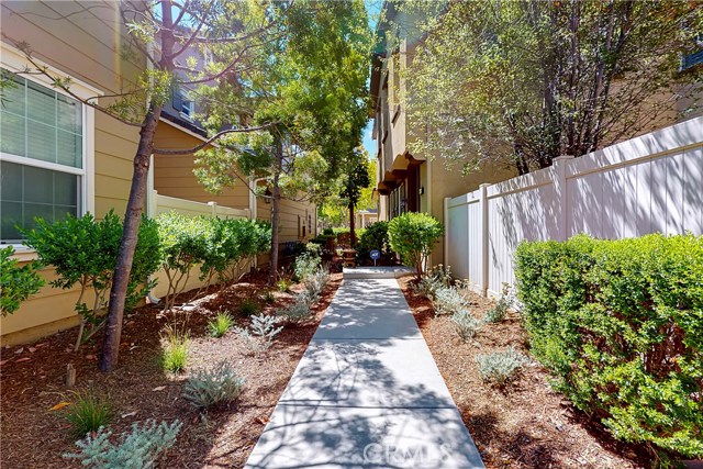 3227 Moss Landing Boulevard Oxnard, California FHA & VA Approved! Welcome to Riverpark and the home of The Collection! This gorgeous 1,384 sq. ft. townhome has 3 bedrooms and 2 bathrooms. This townhome is wonderfully upgraded with an open floorplan and beautiful walnut wood flooring. The chef's dream kitchen features granite countertops, stainless steel appliances, dark kitchen cabinets & included refrigerator. The kitchen is open to the family room with a breakfast bar & outdoor balcony. Two guest bedrooms, laundry room with included washer and dryer plus guest bathroom are down the hall. The huge master has a private patio, en-suite bathroom with dual sinks, shower, and walk-in closet. Direct access to a two-car garage with storage racks, epoxy floors, and a driveway. This home A/C as well. The Riverpark community is conveniently located near new schools, walking trails, several parks, barbecue areas, gazebo, fountains, basketball courts, and tennis courts. Enjoy a short stroll to the recently developed “Collection” with the Century Theaters, Target, Whole Foods, Yardhouse, and The Cheesecake Factory. Easy access to 101 freeway. In Riverpark, you’re not just buying a home, you’re buying a lifestyle.
