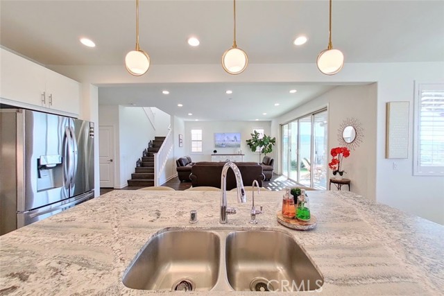 Open concept view of great room from kitchen