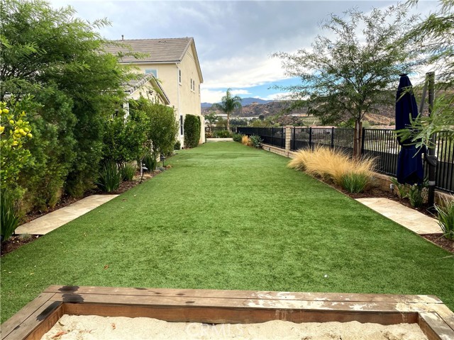 Side yard with Sandbox