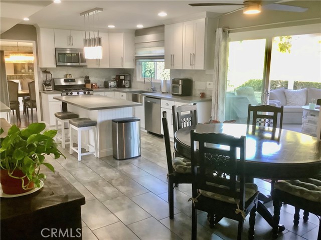 Open kitchen with dual paned slider glass doors