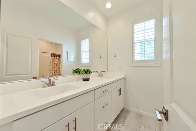 Full bathroom #3 upstairs with double sinks