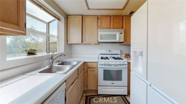 Kitchen with bay window and views