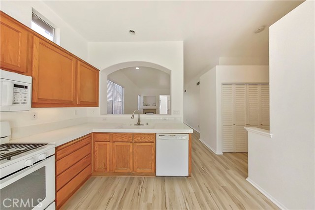 Kitchen facing living room/dining room